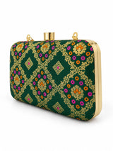 Dark green Mahi box clutch bag by THE TAN CLAN with sleek design and compact size, perfect for evening accessories.
