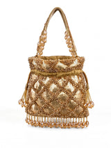 Gold sequined tasselled potli bag with intricate embroidery by THE TAN CLAN, featuring a drawstring closure and traditional design.