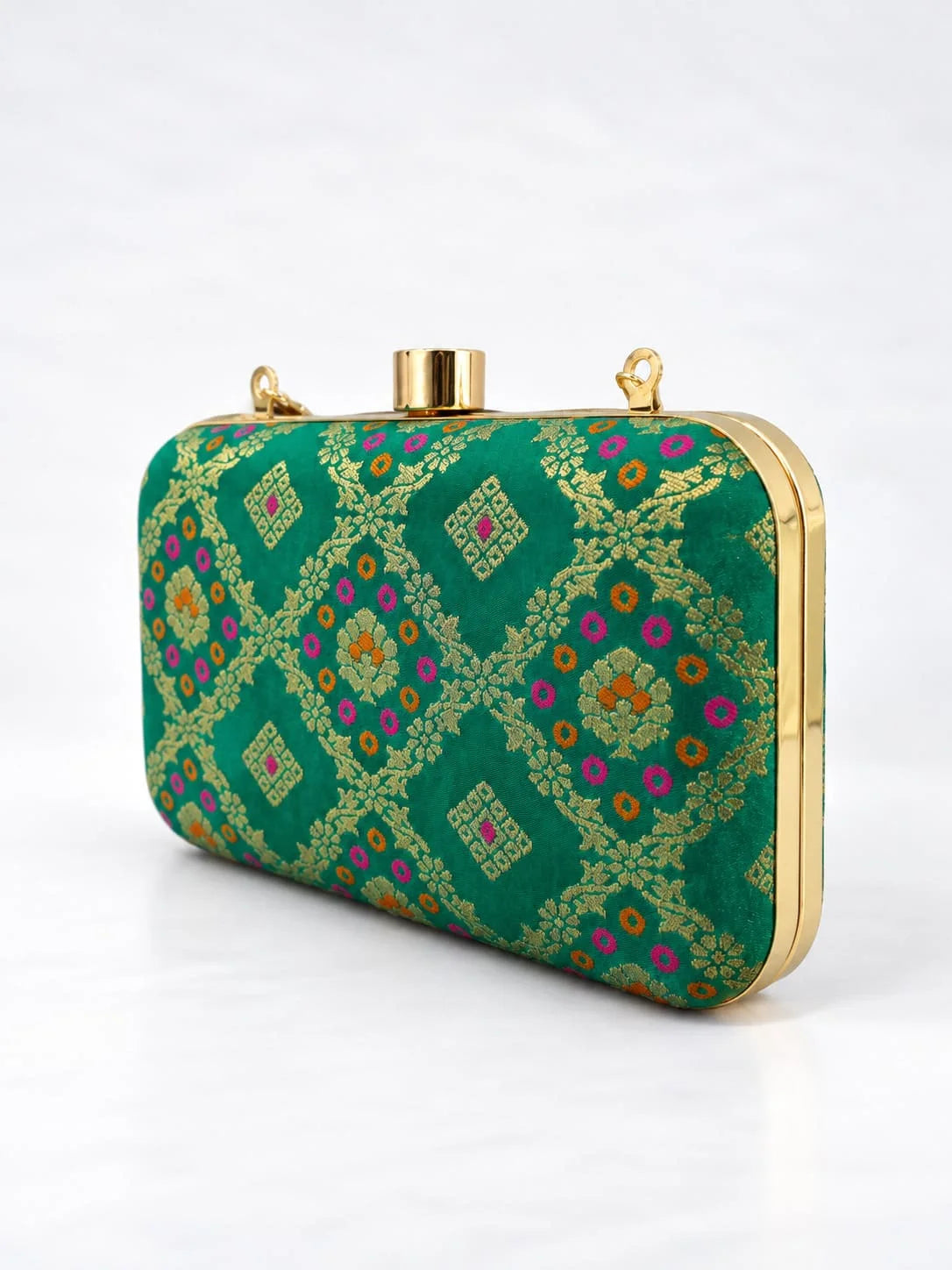 Light green Mahi box clutch by THE TAN CLAN with gold clasp and sleek rectangular design, ideal for elegant evening occasions.