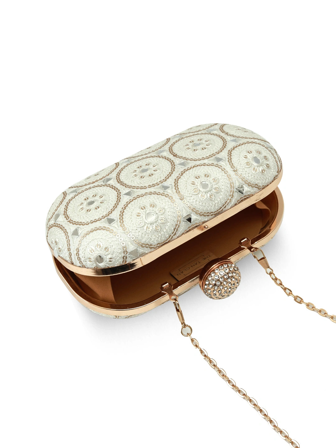 Inaara White Oval Clutch by The Tan Clan featuring a sleek oval shape and elegant white leather finish.