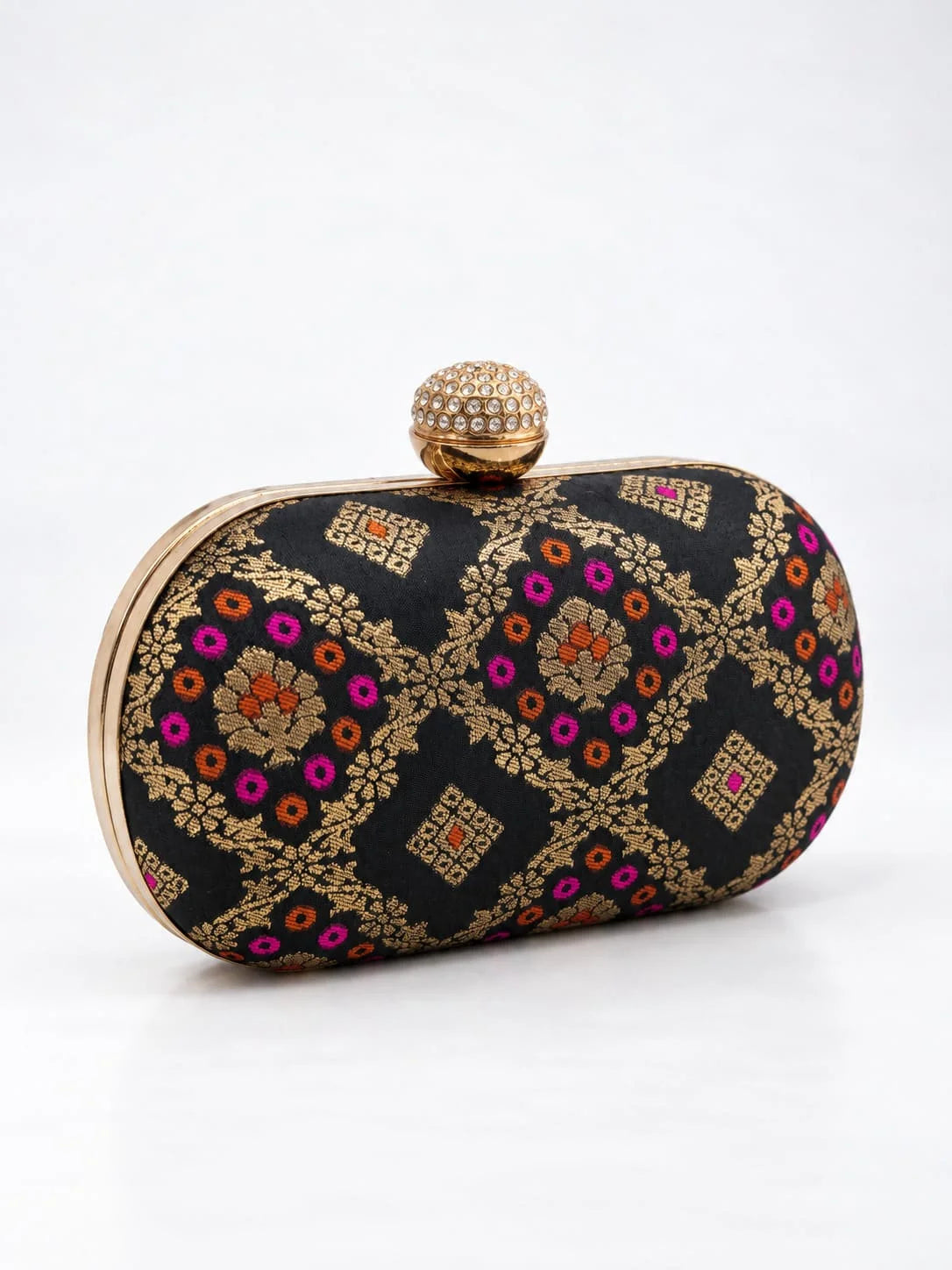 Black oval clutch bag from THE TAN CLAN featuring a sleek design and compact size for elegant evening use.