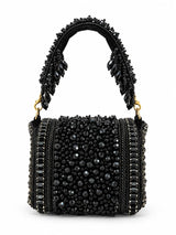 Zeenat black beaded mini flap bag by THE TAN CLAN featuring intricate beadwork and a compact design with a flap closure.