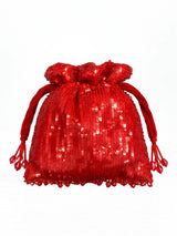 Red sequined tasselled potli bag by THE TAN CLAN featuring intricate embroidery and decorative tassels for festive occasions.