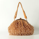 Golden Rosa Batua bag by The Tan Clan with a detachable handle, stylish and elegant accessory in a sleek design.