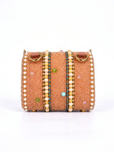 Hand-embroidered mini flap bag in peach with intricate embroidery, by THE TAN CLAN, showcasing detailed craftsmanship and vibrant color.