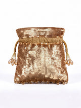Gold sequined tasselled potli bag with intricate embroidery and hanging tassels, stylish and festive accessory by THE TAN CLAN