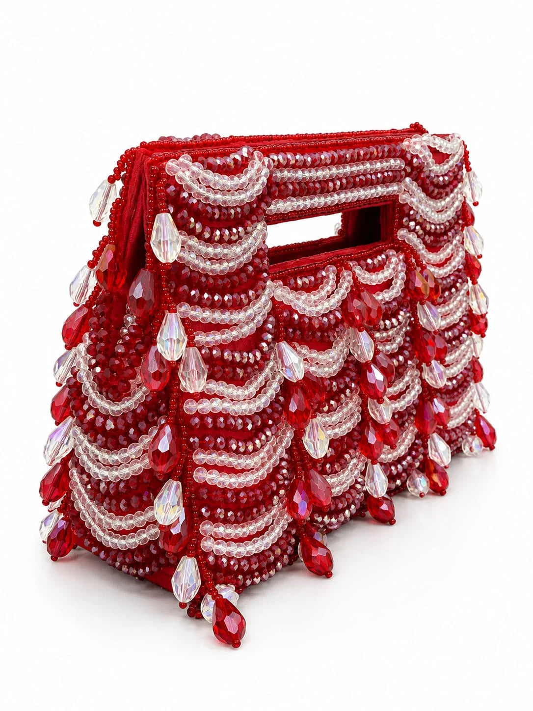 Red handcrafted beaded bag by THE TAN CLAN with intricate beadwork and a compact, stylish design.
