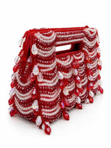 Red handcrafted beaded bag by THE TAN CLAN with intricate beadwork and a compact, stylish design.
