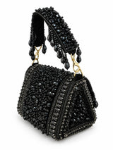 Black beaded mini flap bag by THE TAN CLAN featuring beaded detailing and a compact design.