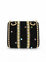 Black hand-embroidered mini flap bag by THE TAN CLAN with intricate embroidery and compact design.
