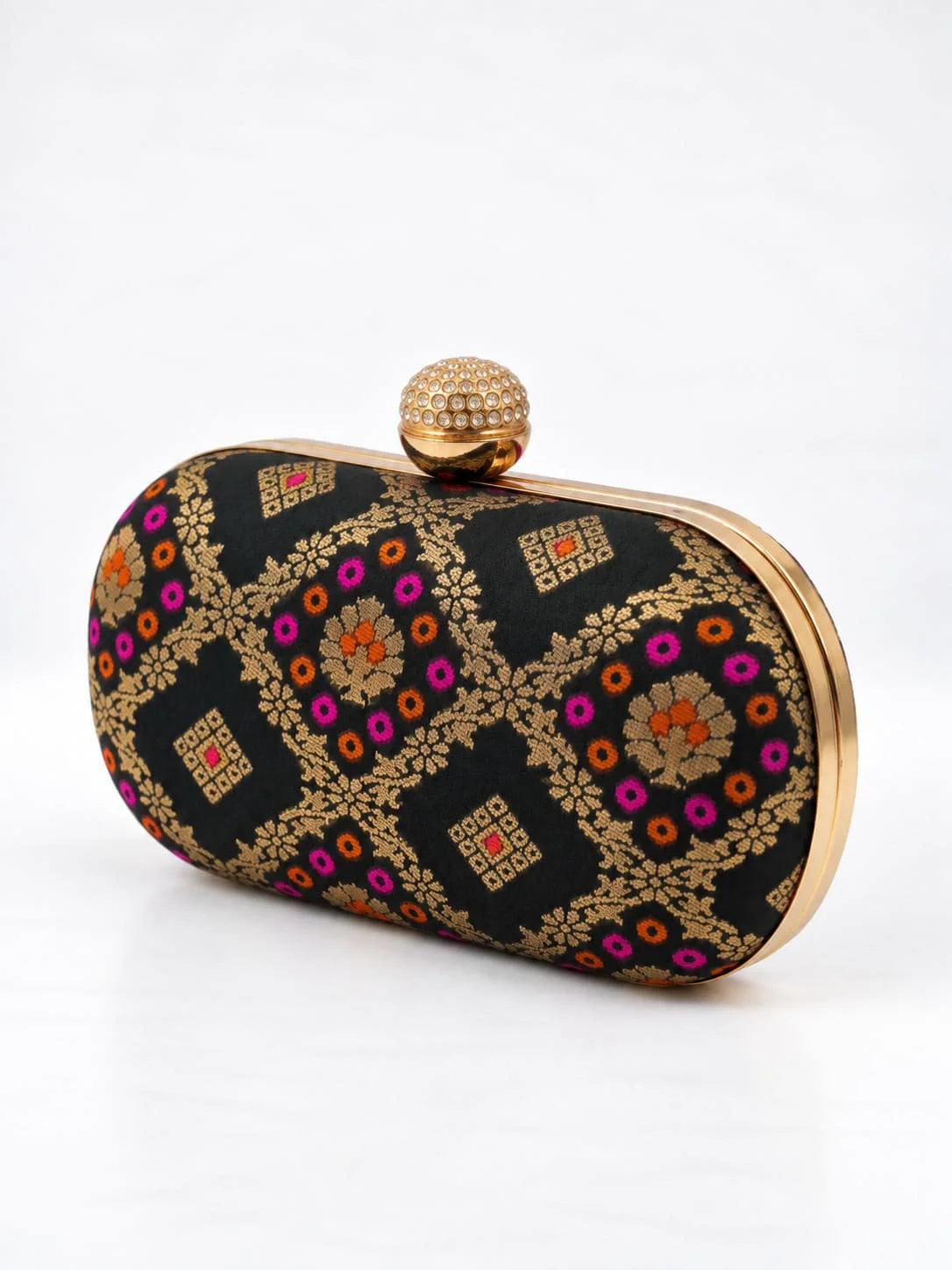 Black oval clutch by THE TAN CLAN featuring a sleek design and compact size, perfect for evening and formal occasions.