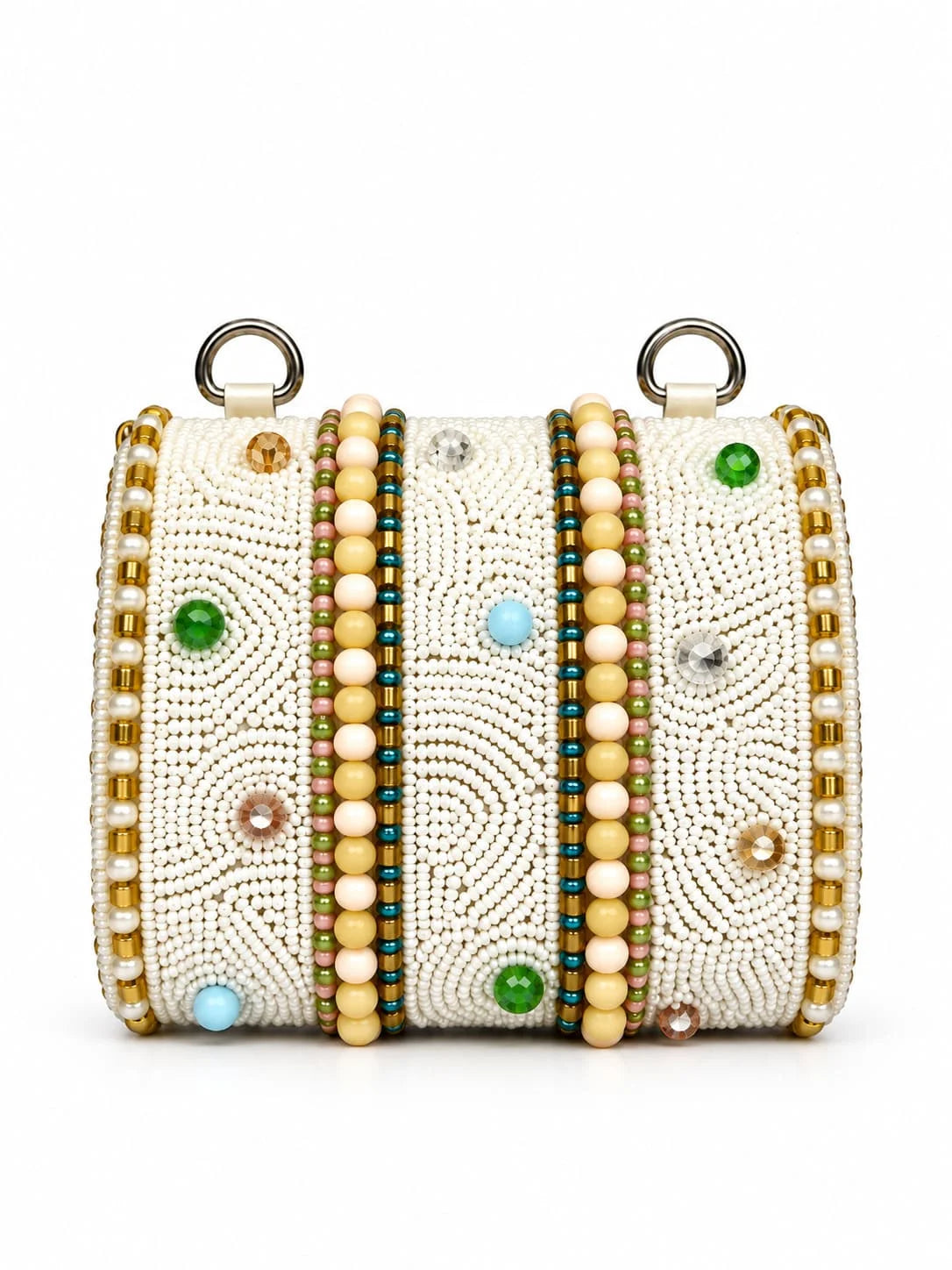 White hand-embroidered mini flap bag from THE TAN CLAN with intricate detailing and compact design.