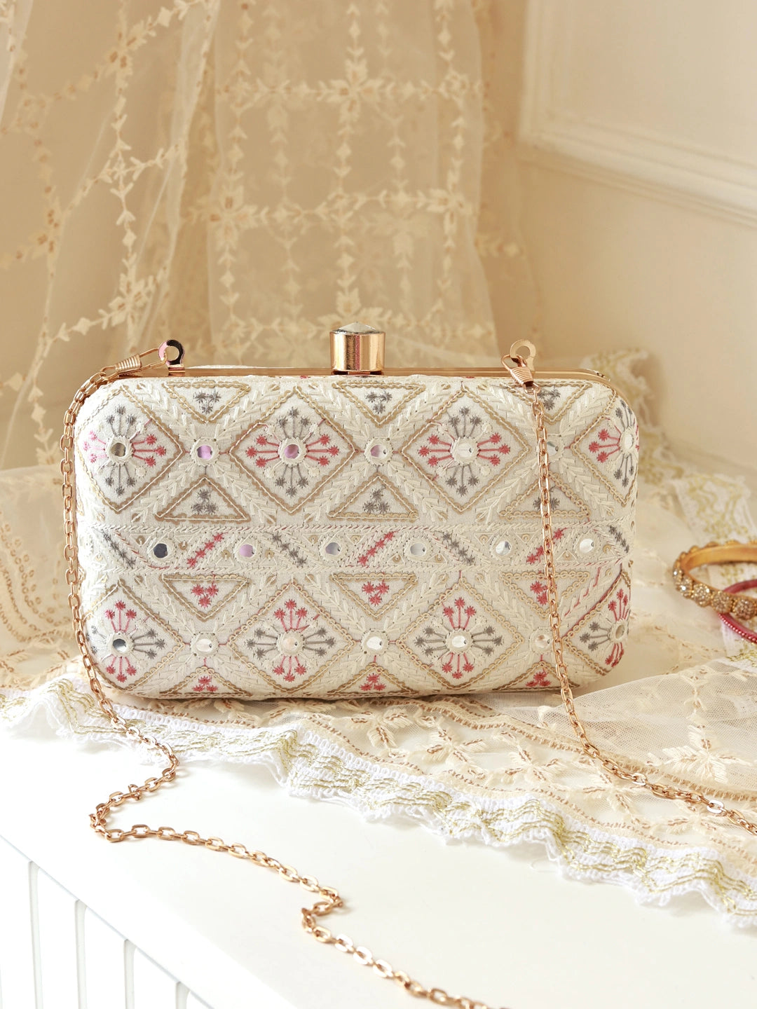 White box clutch by The Tan Clan with clean design and structured shape, perfect for elegant evening accessories.