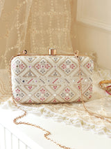 White box clutch by The Tan Clan with clean design and structured shape, perfect for elegant evening accessories.