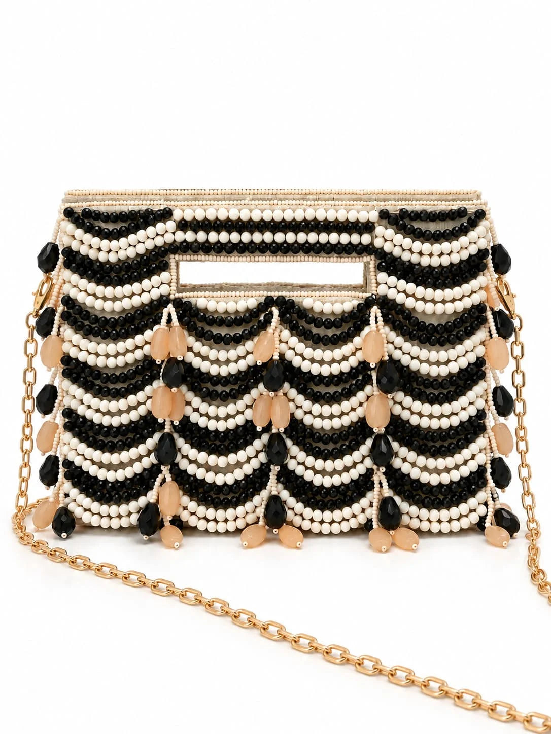 Multicolor handcrafted beaded bag with intricate detailing from THE TAN CLAN, featuring vibrant beads and a compact design.