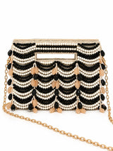 Multicolor handcrafted beaded bag with intricate detailing from THE TAN CLAN, featuring vibrant beads and a compact design.