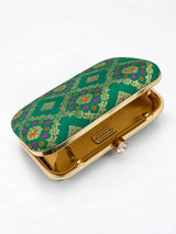 Light green Mahi box clutch by THE TAN CLAN featuring a sleek, compact design with a structured silhouette and elegant finish.