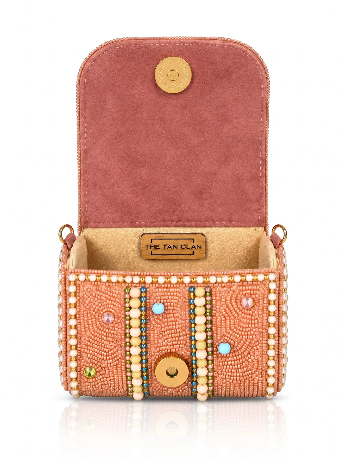 Hand embroidered Basra Peach mini flap bag by THE TAN CLAN featuring intricate embroidery and a compact, stylish design.