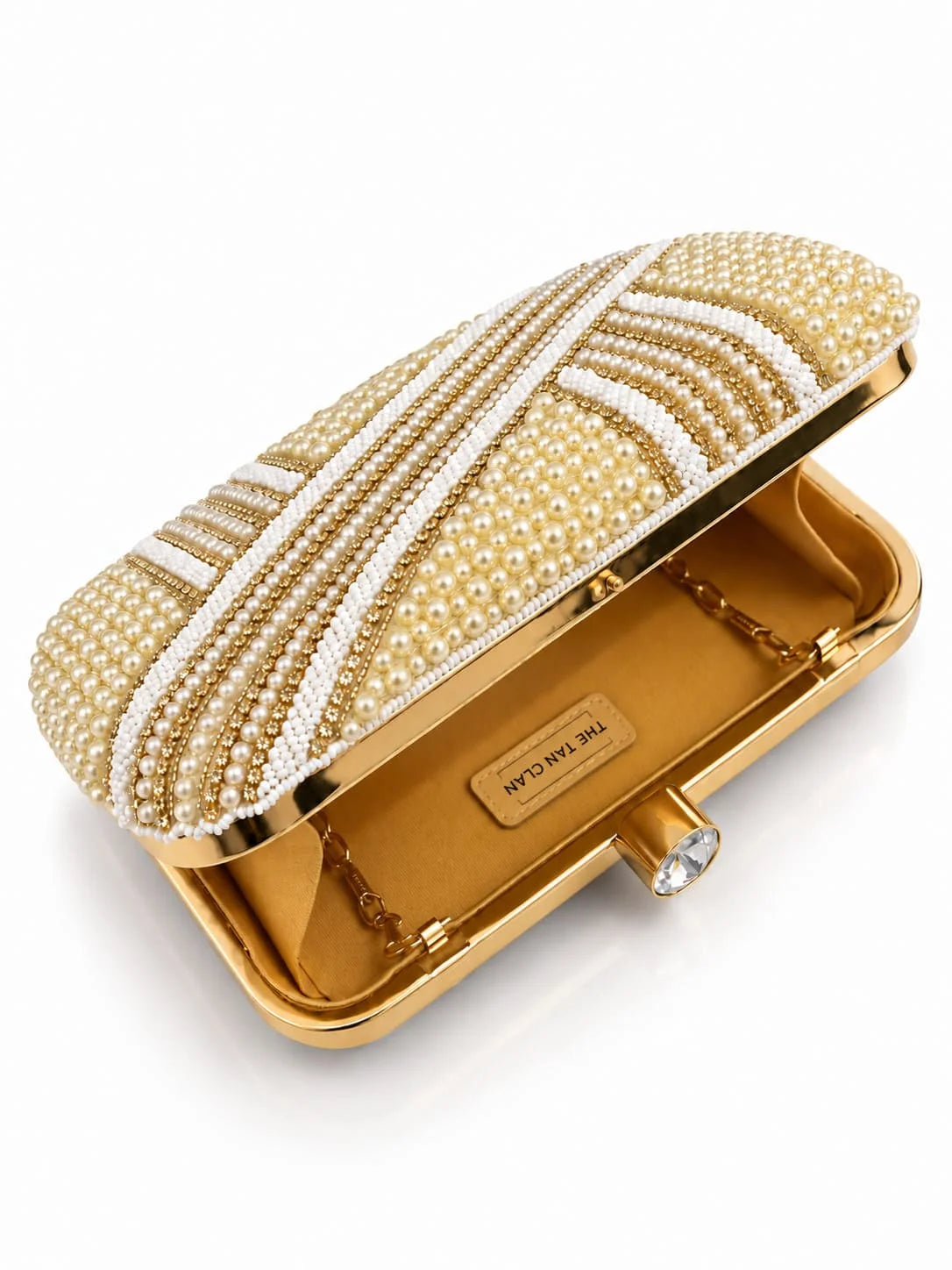 Zara Pearl Box Clutch by THE TAN CLAN featuring a sleek rectangular shape with pearl embellishments and a metallic clasp.