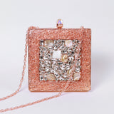 Rose gold embellished brass clutch bag with intricate detailing from The Tan Clan's Aafreen collection.