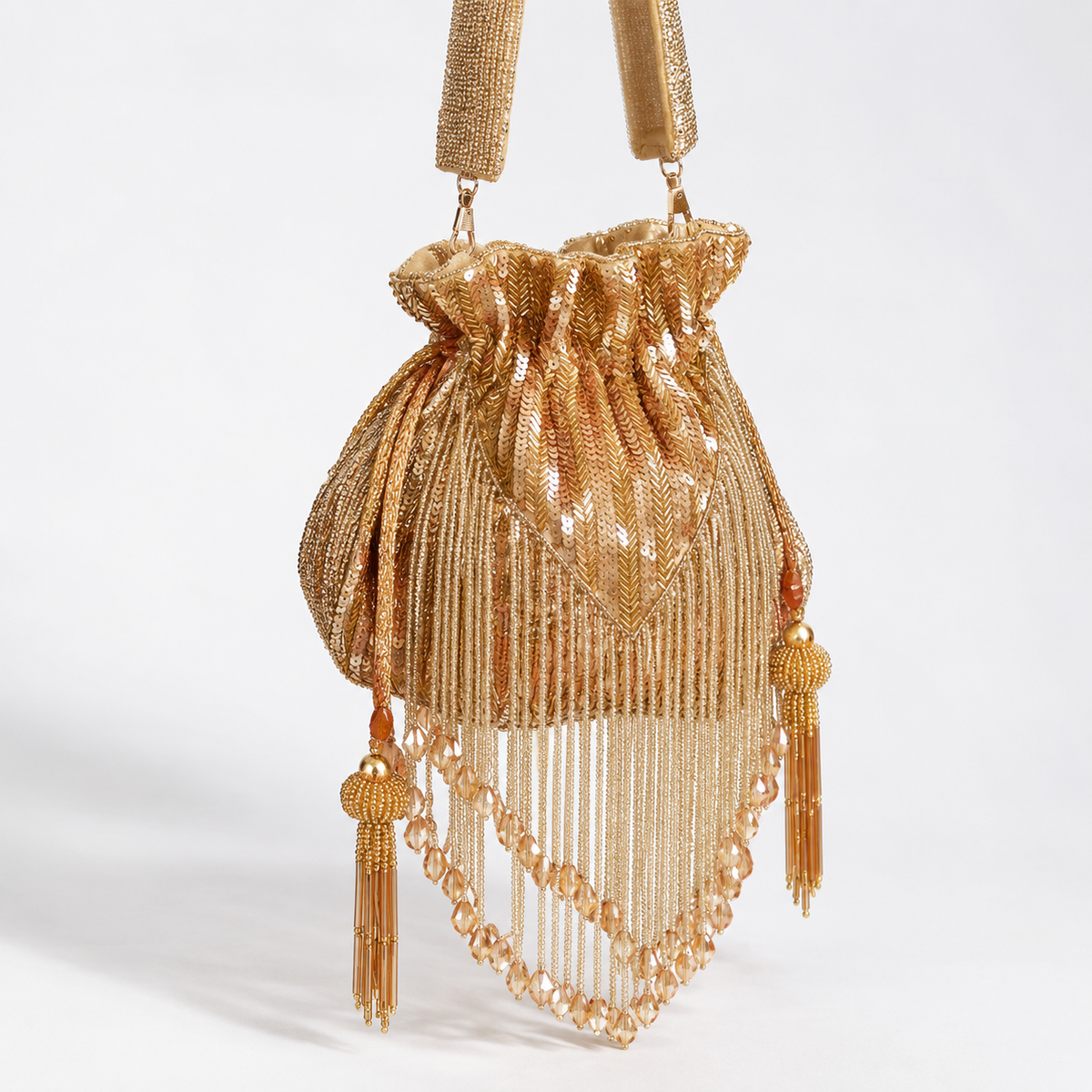 THE TAN CLAN Twinkle Heavy Tassles Potli with Handle - Gold DBP