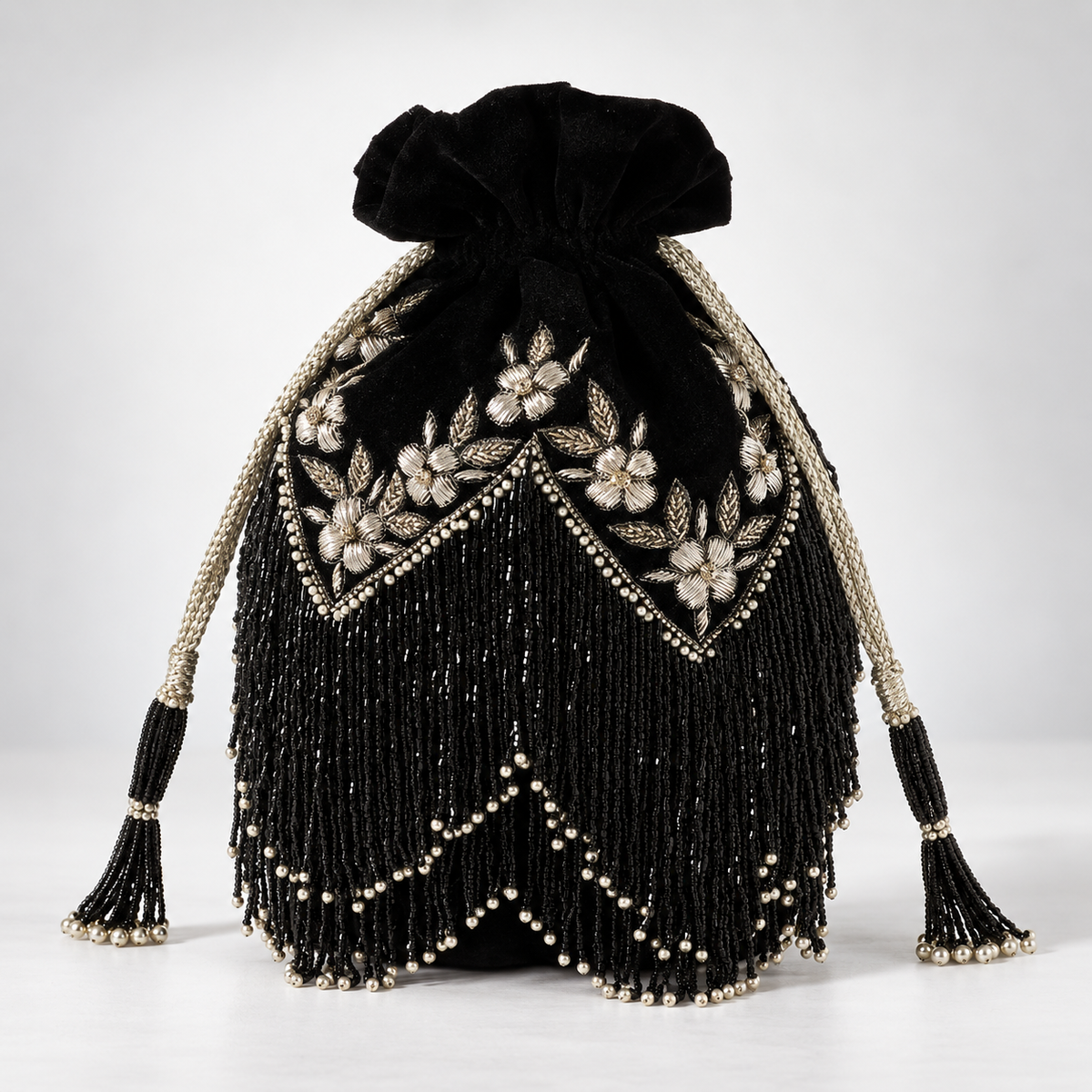 Keisha Black Tassle Potli with Handle DBP