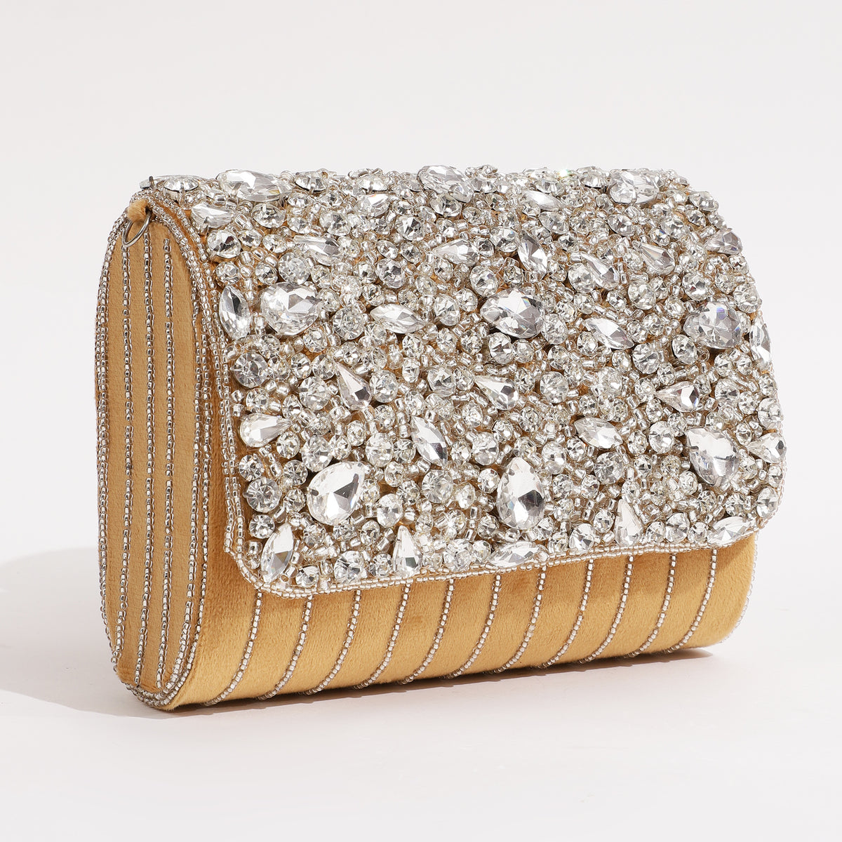 Gold Grace Embellished Flap Over Bag by The Tan Clan with decorative embellishments and a stylish flap closure.