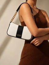 Elle black colorblock chain strap shoulder bag with luxurious cream and black design, featuring a stylish and elegant look.