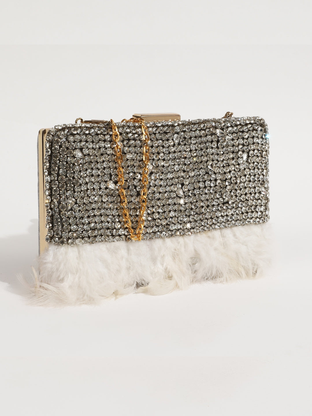White hand-embroidered feather clutch bag by The Tan Clan featuring intricate embroidery and elegant design.