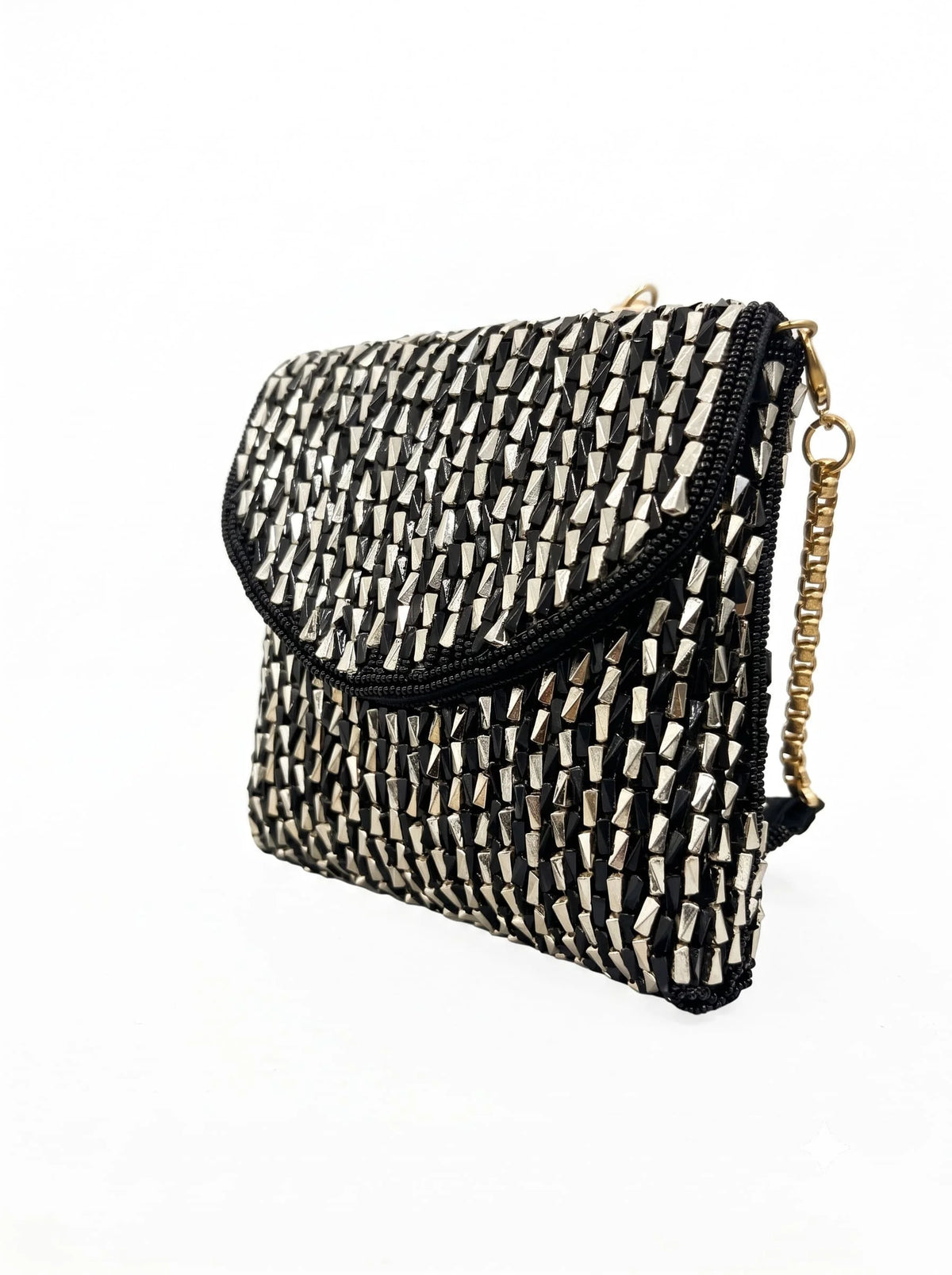 Black envelope bag from THE TAN CLAN featuring a sleek, minimalist design suitable for stylish everyday use.