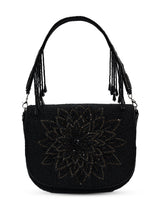 Black Eva flap over bag by The Tan Clan, showcasing a sleek design with a flap closure and stylish craftsmanship.