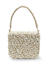 Tan Kate flap over bag from The Tan Clan featuring a stylish design with a flap closure and shoulder strap.