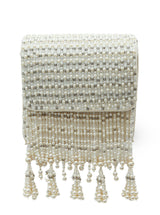 Mira White Flap Over Bag from The Tan Clan featuring a sleek white leather design with a flap closure and top handle.