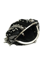 Black pearl Batua bag by The Tan Clan featuring traditional design and woven details.