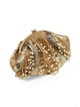 A gold pearl Batua Bag from The Tan Clan featuring a traditional design with elegant embellishments.