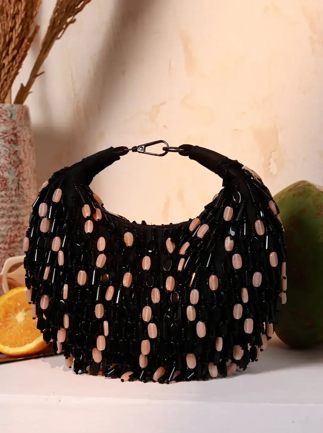 Bella Black Multicolor Half Moon Batua Bag by The Tan Clan, featuring a stylish design and vibrant multicolor accents.