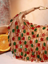 Red and multicolor Bella half-moon Batua bag by The Tan Clan, featuring vibrant design and compact, stylish shape.