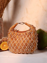 Diya Pearl Half Moon Batua Bag by The Tan Clan featuring pearl accents and a stylish half-moon design for traditional and modern occasions.