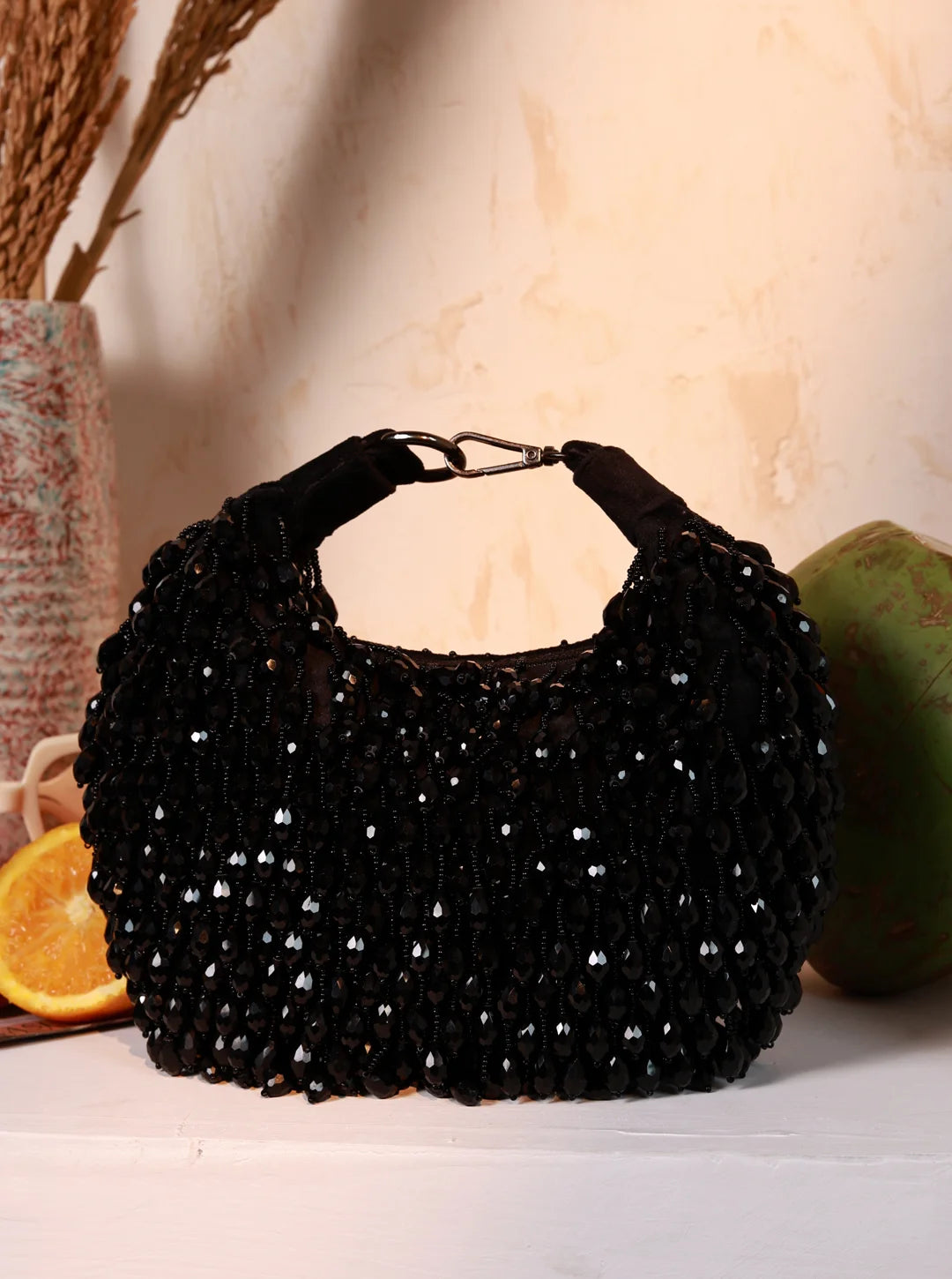 Jia Black Half Moon Bag by The Tan Clan, stylish Batua Bag with sleek black design and curved shape, perfect for everyday use.