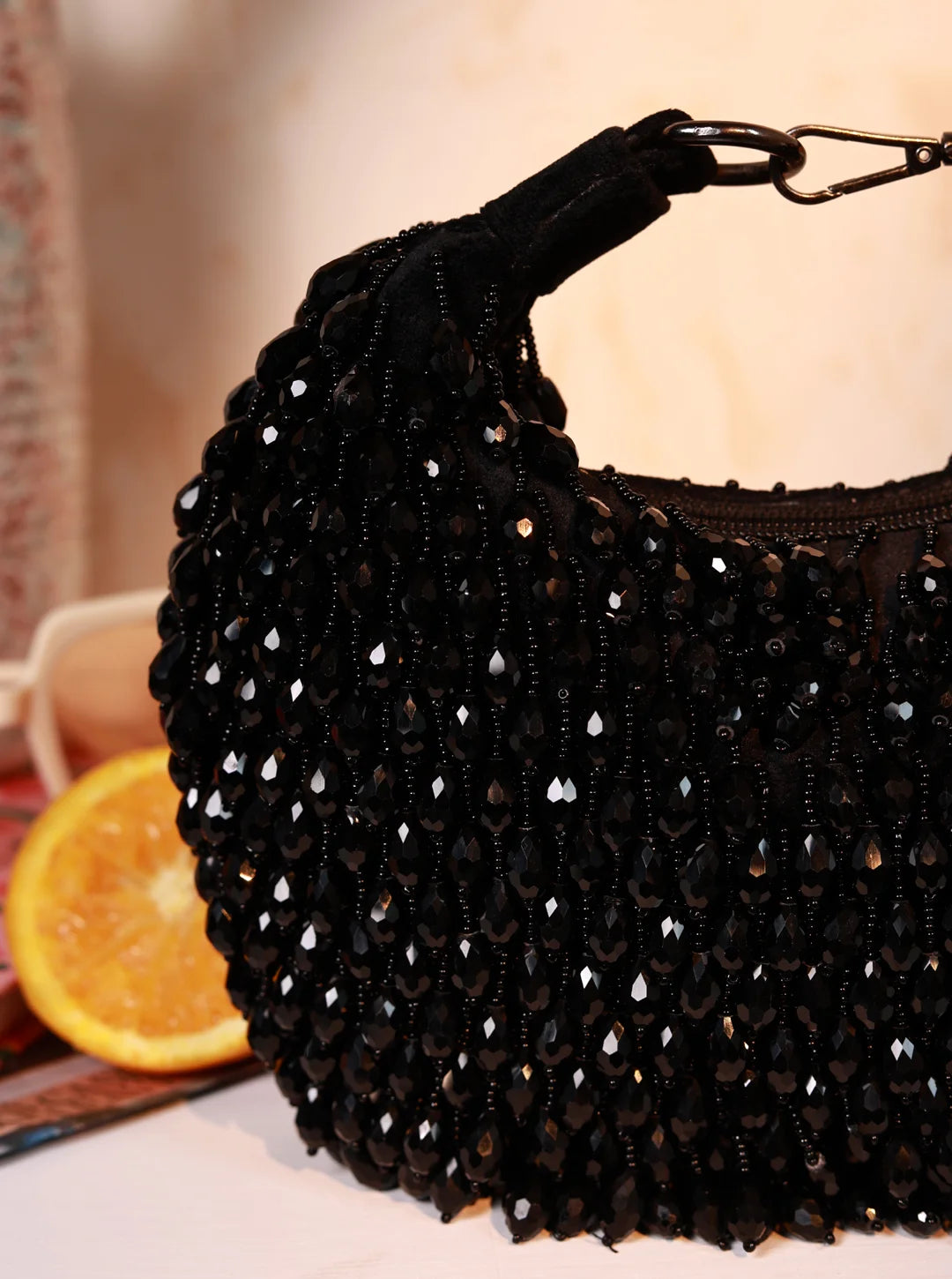 Jia Black Half Moon Bag by The Tan Clan, stylish batua bag with curved shape and black leather finish, ideal for casual or formal use