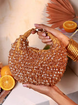 Jia Gold Half Moon Batua Bag by The Tan Clan featuring a sleek gold finish and elegant half-moon shape.