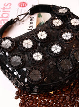 Black half-moon Batua bag with mirror detail from The Tan Clan Kim Mirror collection, featuring a sleek, modern design.