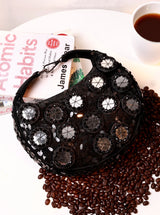 Black Kim Mirror Half Moon Bag by The Tan Clan, a stylish Batua bag with a sleek half moon shape and mirror accents.