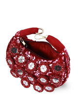 Red half-moon batua bag with mirror detail from The Tan Clan Kim Mirror collection, featuring a stylish curved design.