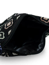 Luna Black Half Moon Batua Bag by The Tan Clan featuring a stylish black leather half-moon-shaped design with a shoulder strap.
