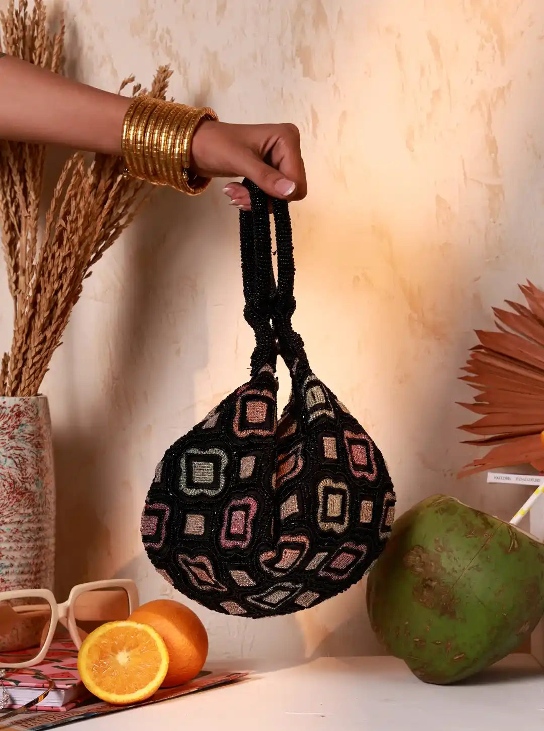 Luna Black Half Moon Batua Bag by The Tan Clan featuring a sleek, semi-circular design and elegant black leather finish.