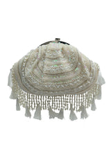 Tan Tan Clan Nora tasselled half moon Batua bag with decorative tassels and compact design, perfect for casual or ethnic outfits.