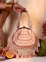 Nora Tasselled Half Moon Batua Bag by The Tan Clan featuring tassel details and a crescent shape in stylish leather.