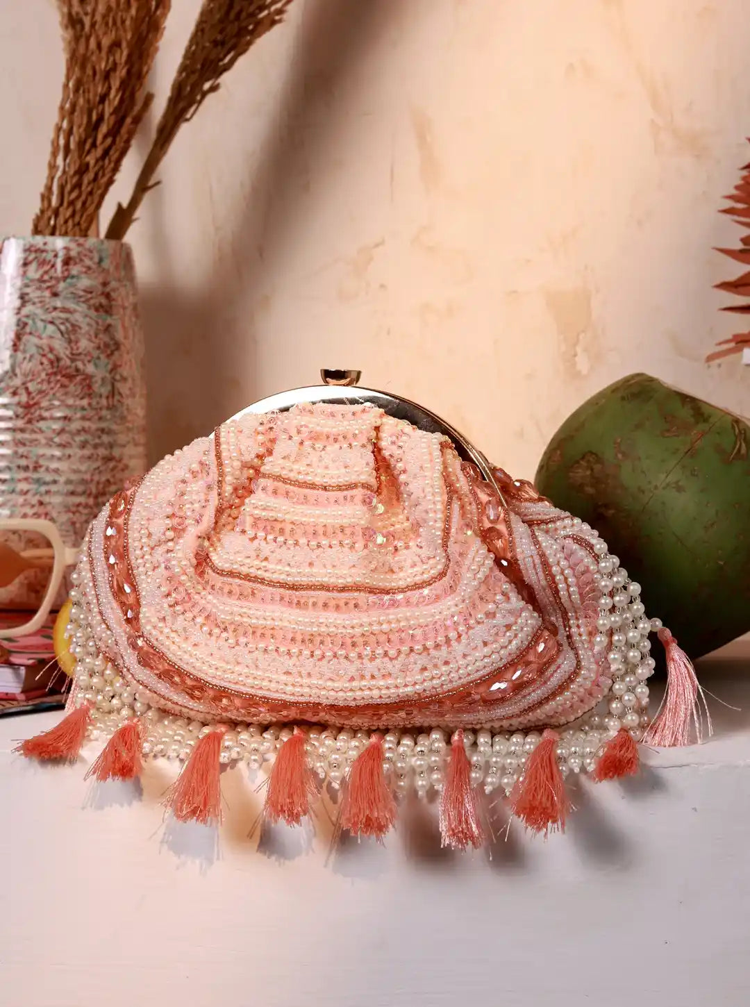 Nora Tasselled Half Moon Batua Bag by The Tan Clan with tassel details and half-moon shape in natural leather finish.