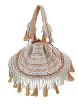 Nora tasselled half moon Batua bag in tan leather with tassel details, stylish and compact for everyday use.